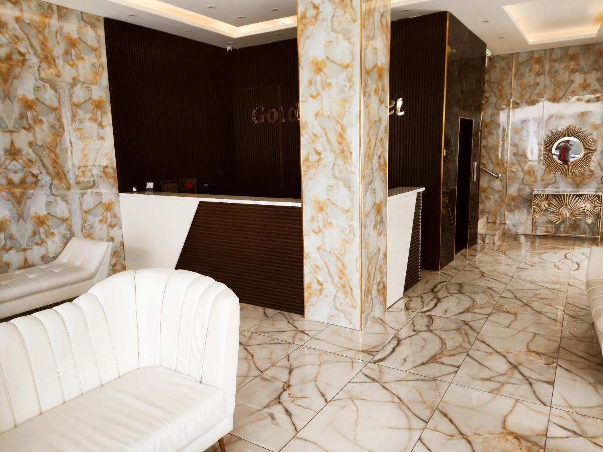 Golden Plaza Hotel Аман Екстериор снимка